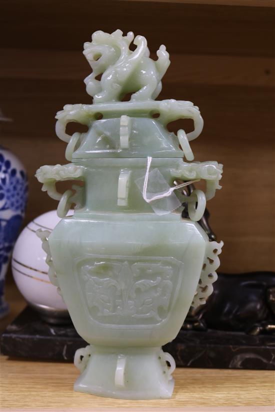 A Chinese bowenite jade vase, cover and stand in box